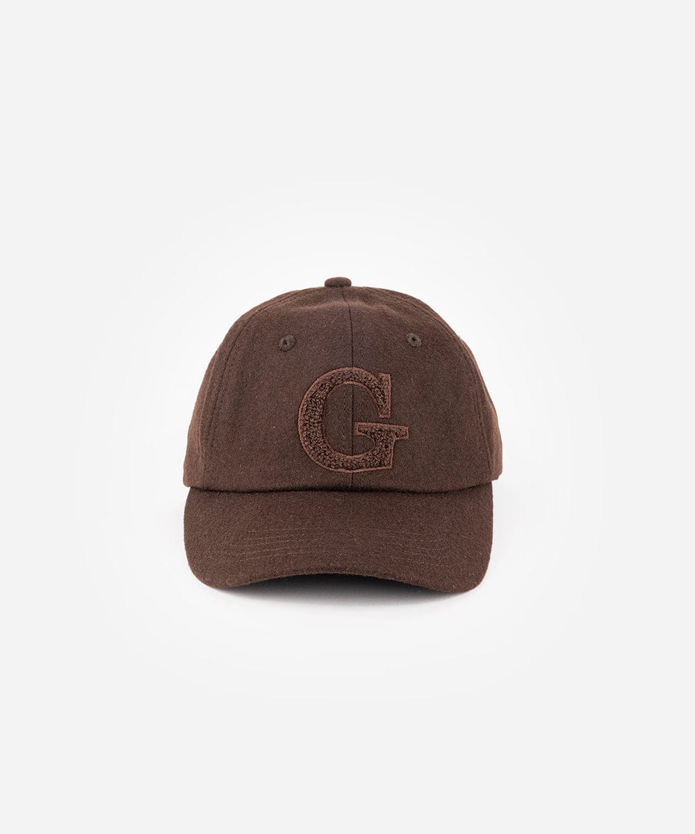 A chocolate brown baseball cap with the letter 'G' on a white background #color_chocolate brown