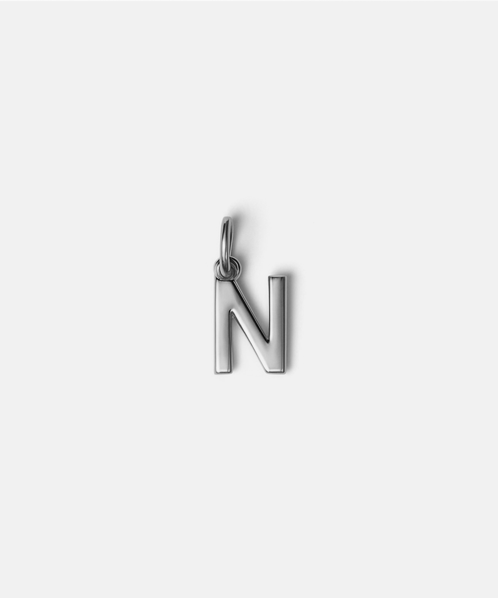 Silver letter 'N' hat charm on a white background #color_silver