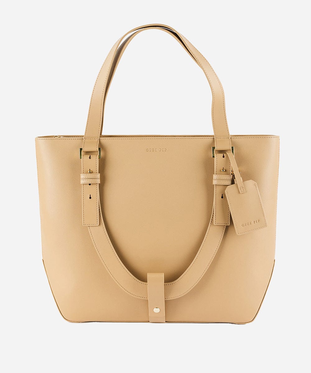 A beige Hayes Hat Carrying Tote made of genuine leather, displayed against a white background.  #color_tan