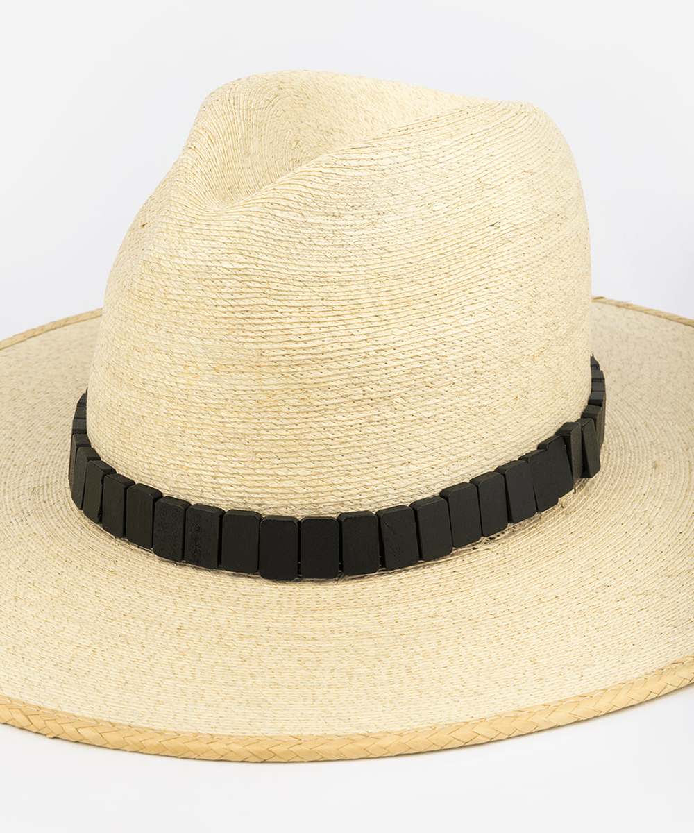 Beige straw hat with a black band on a white background #color_black