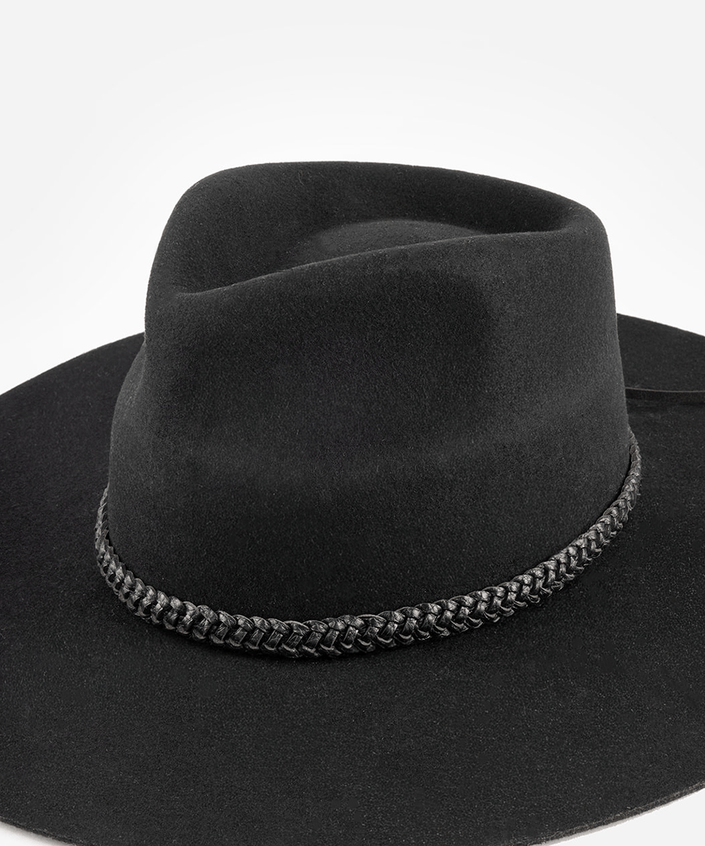 Black cowboy hat with braided band on a white background #color_black