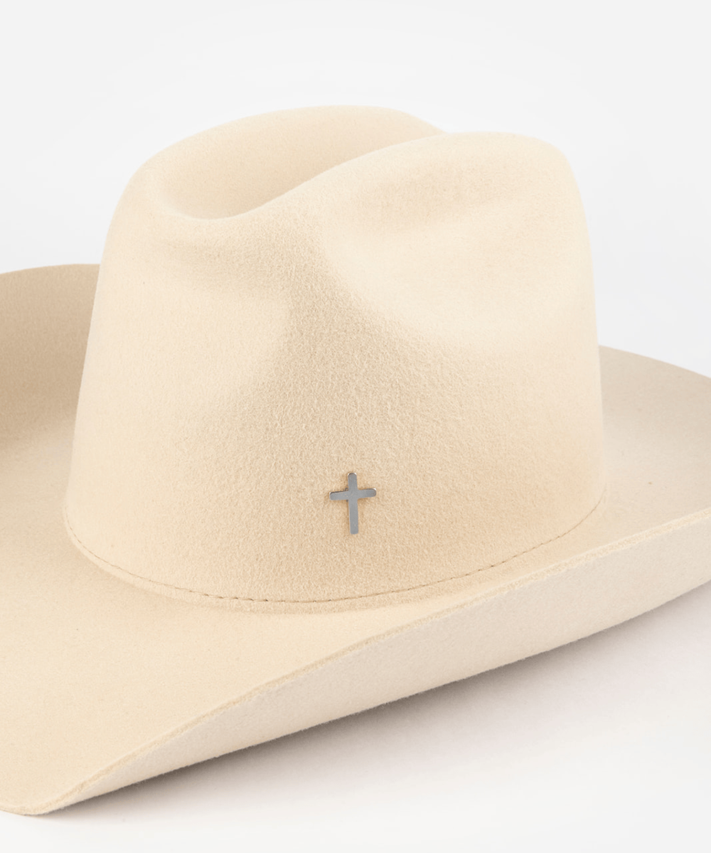 Pink cowboy hat with a silver cross-shaped hat pin on a white background #color_silver