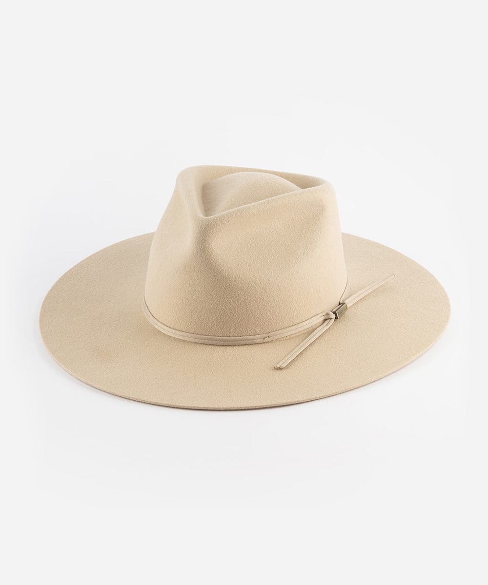 A cream fedora hat with a wide flat brim and a tonal grosgrain ribbon band. #color_cream