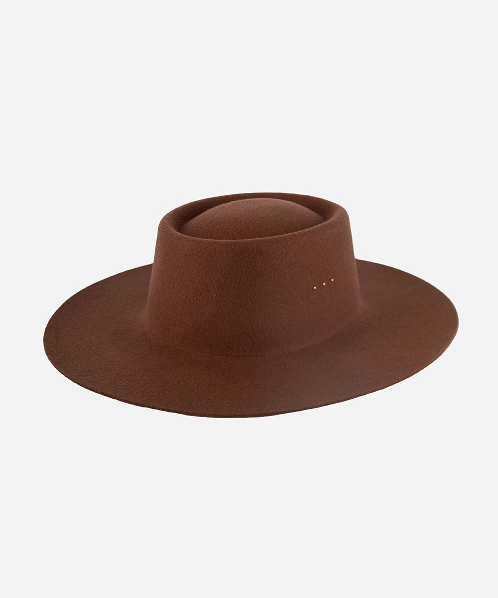 A dark oak colored boater hat with a minimalistic design and three gold plated studs on the crown. #color_dark oak
