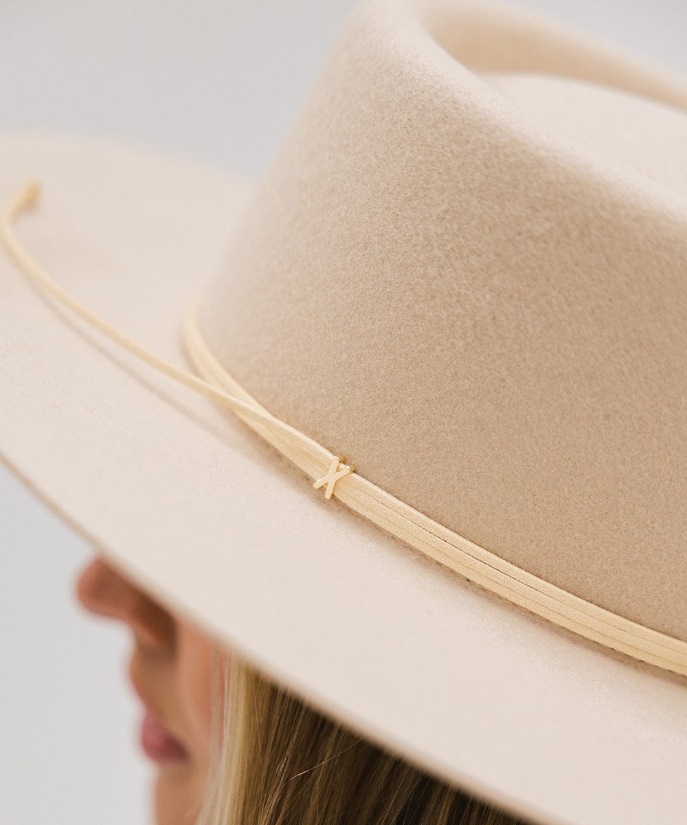 A close-up image of a cream Maise Classic Flat Brim Hat with a hat band #color_cream