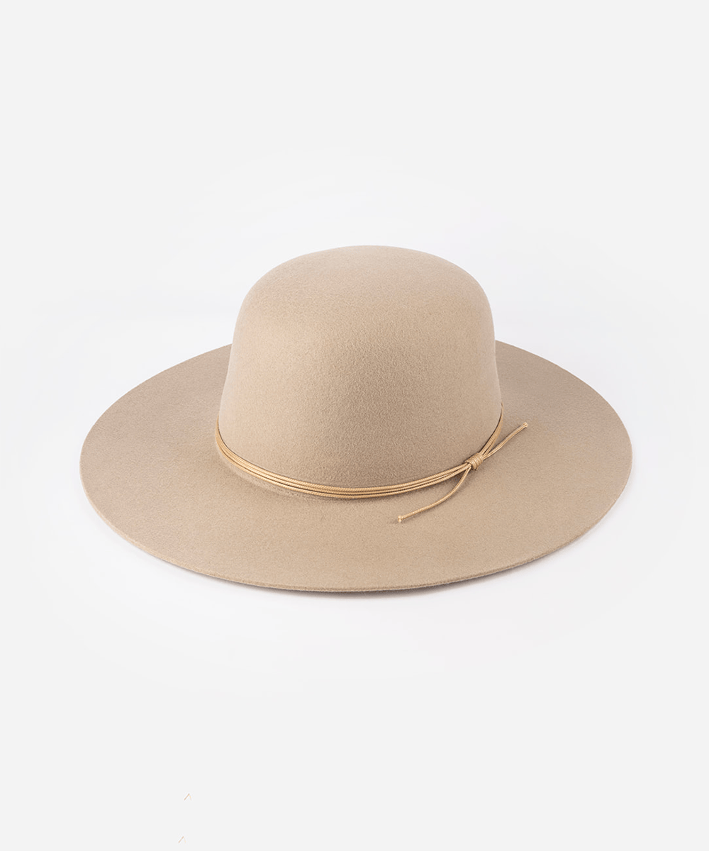 A open crown hat with a structured semi-wide brim and a tonal triple-strand waxed leather band against a plain background #color_sand