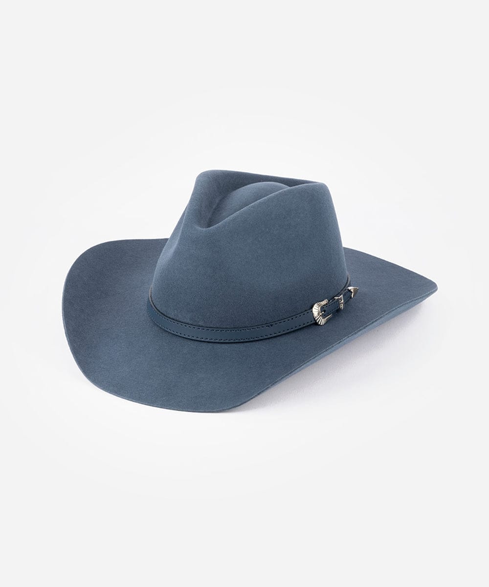 Vintage blue colored cowboy hat with a hat band on a white background #color_vintage blue