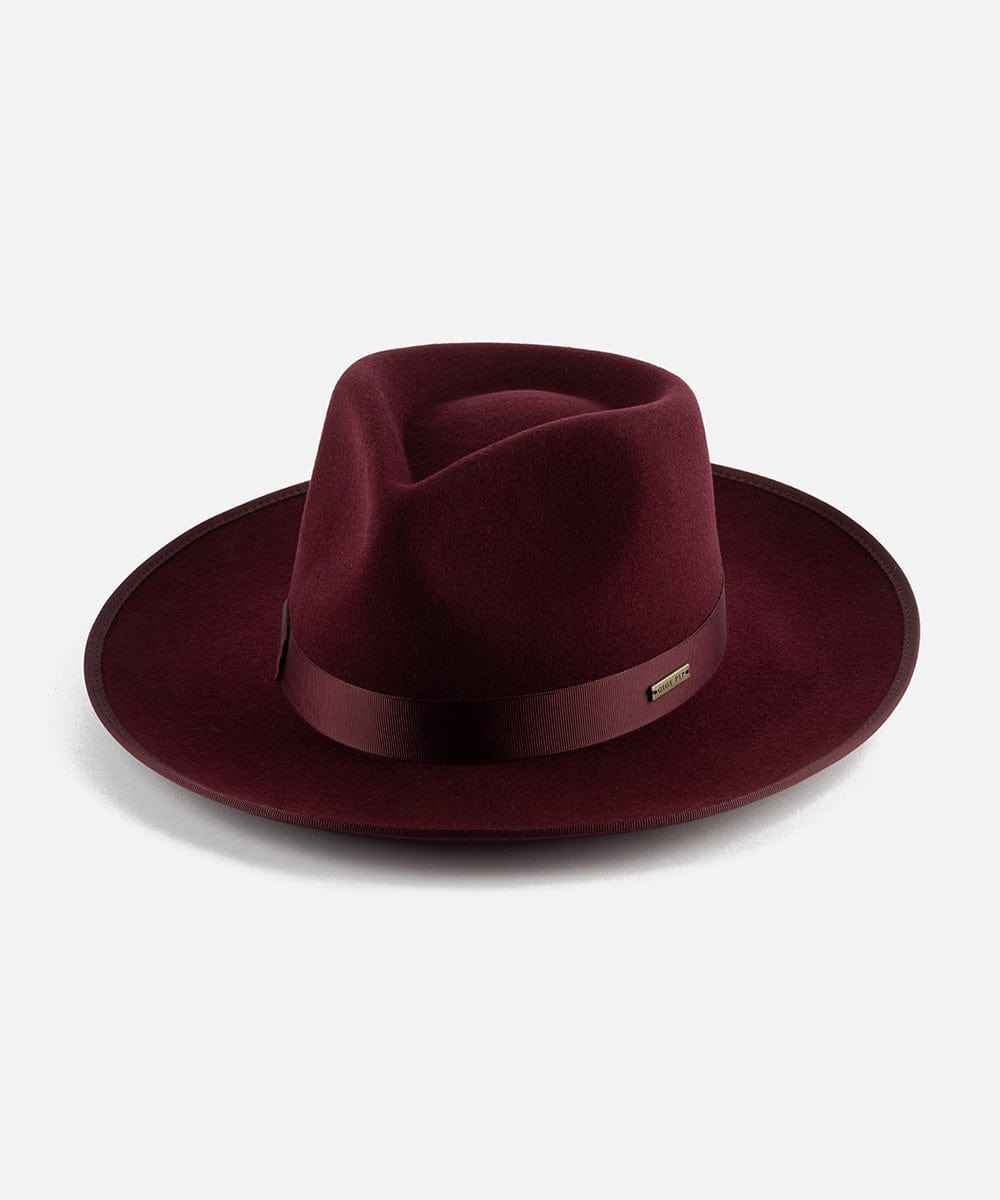 Wine colored fedora hat with a band on a white background #color_wine