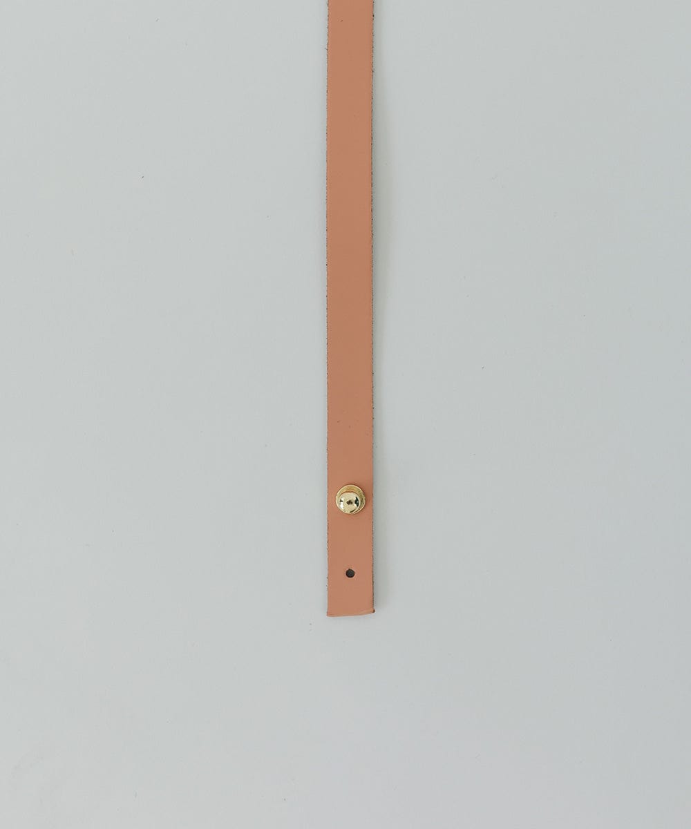 A sunset colored genuine leather thin hat band with a pin on a white background #color_sunset
