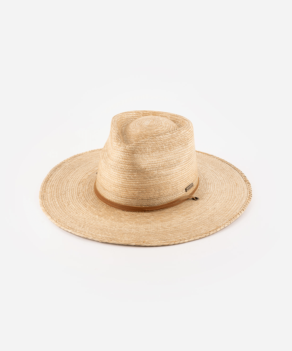 An oak colored palm straw sun hat with a teardrop fedora crown and a wide flat brim, featuring a brown genuine leather chinstrap. #color_oak